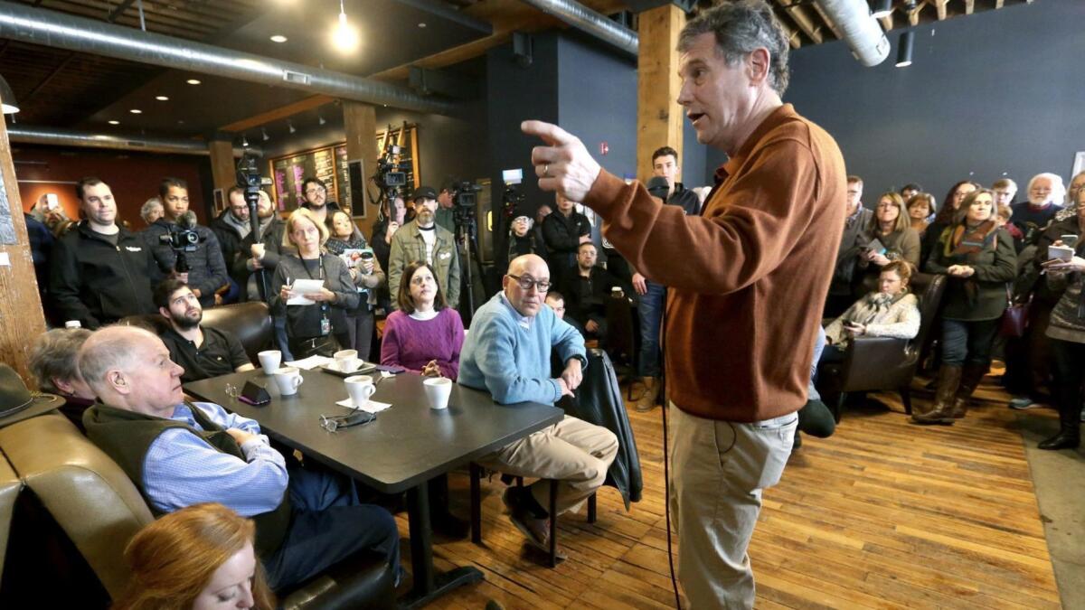 Sen. Sherrod Brown, an Ohio Democrat who is weighing a presidential bid, speaks during a meet and greet on Saturday at Inspire Cafe in Dubuque, Iowa.