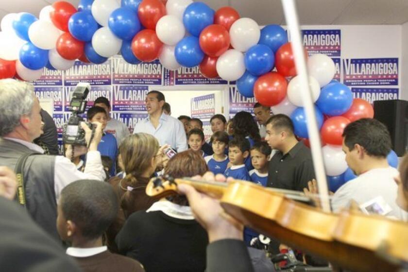 Los Angeles Mayor Antonio Villaraigosa sings along with some mariachis at the campaign kickoff rally in his field office in Boyle Heights. Villaraigosa opened his office less than four weeks before the March 3 primary election.