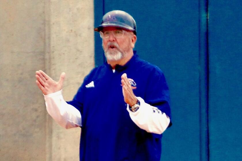Mike Smith of Eastvale Roosevelt is The Times' softball coach of the year.