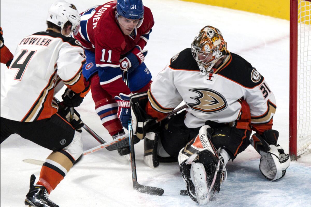 Ducks goalie Frederik Andersen makes a save against Canadiens right wing Brendan Gallagher in the second period Thursday night in Montreal.