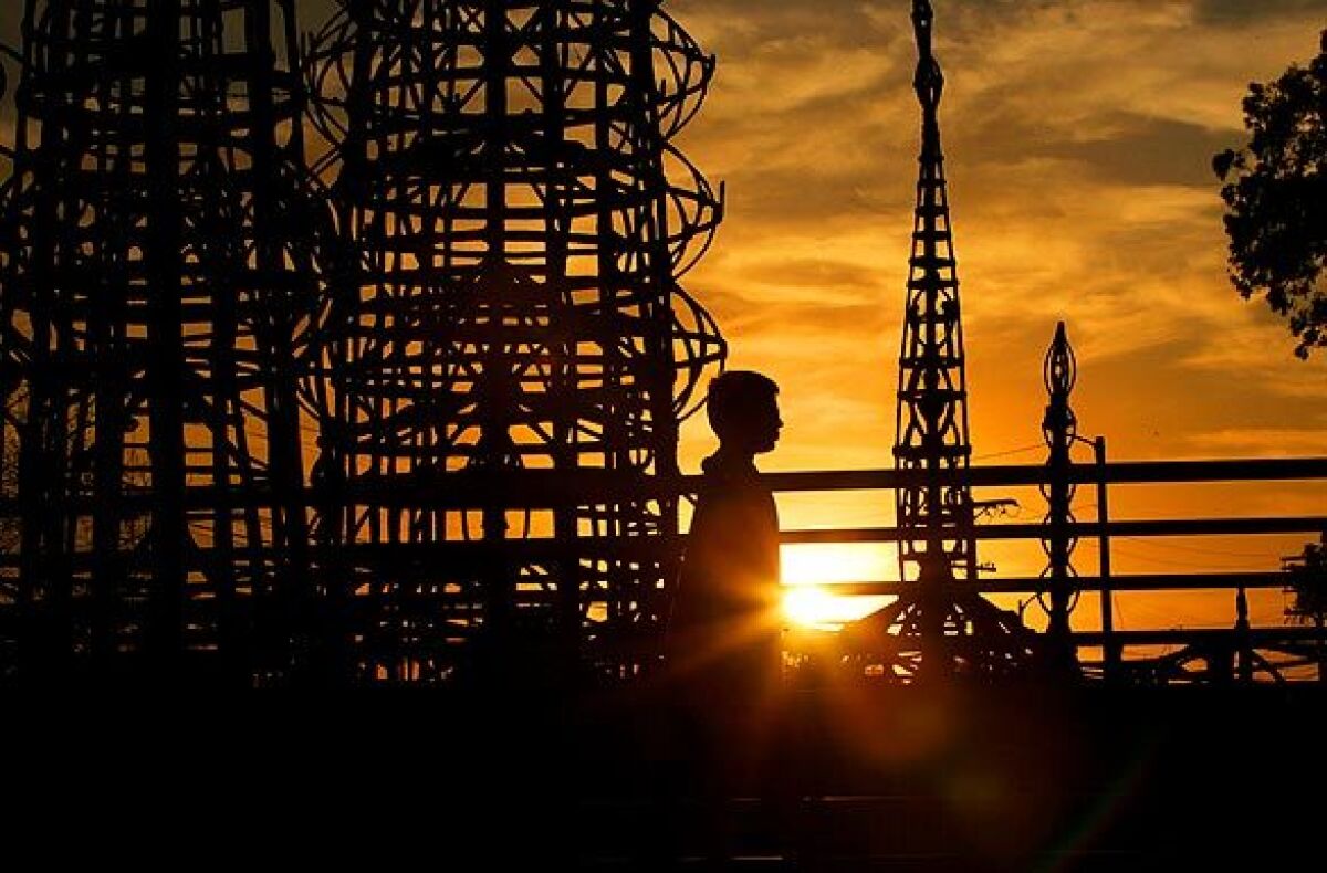 Emanuel Berry, 12, plays in the Watts Towers Art Center Amphitheater as the sun sets on a warm February day.