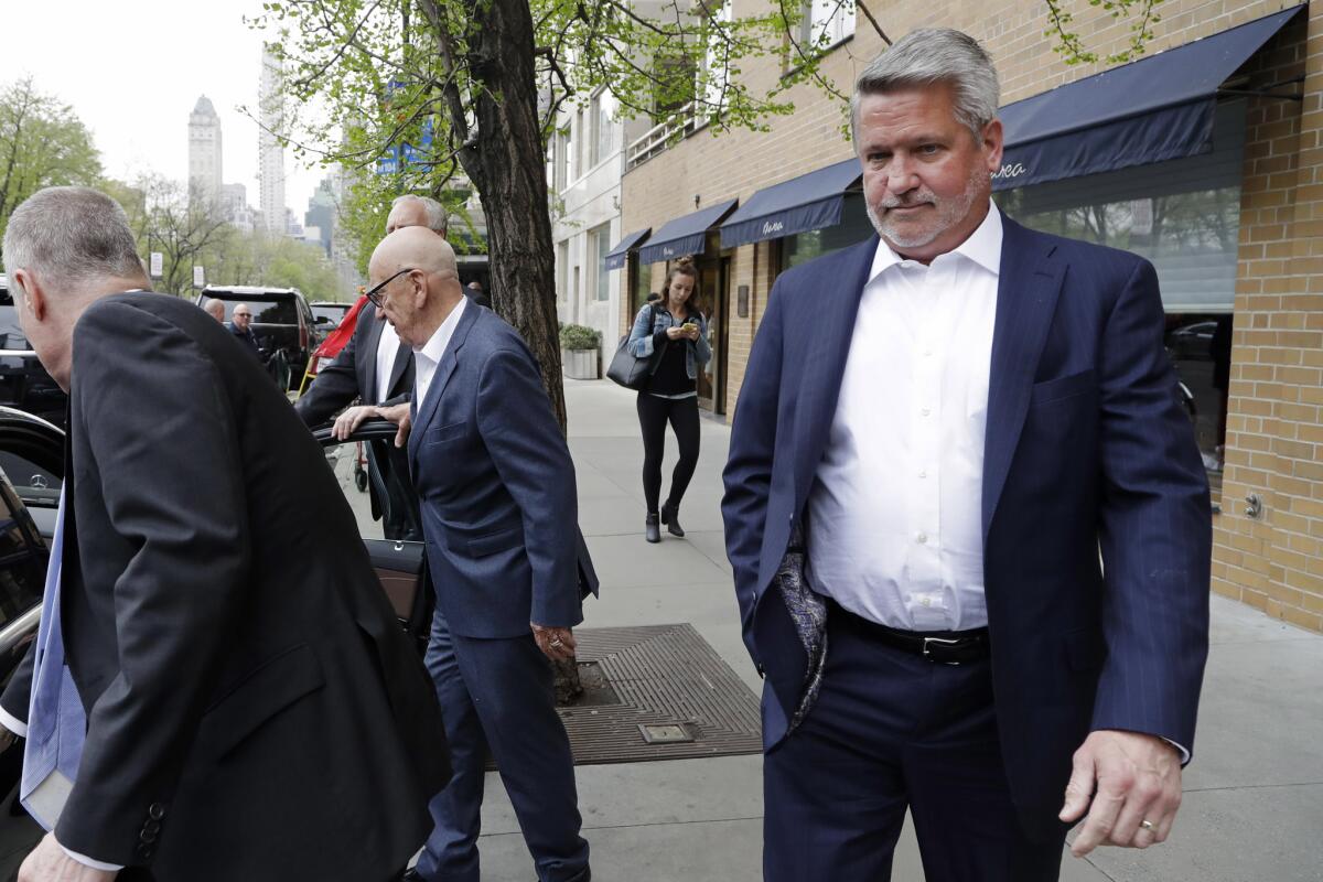 Fox News co-president Bill Shine, right, leaves a New York restaurant with Rupert Murdoch, second from right, on April 24, 2017.