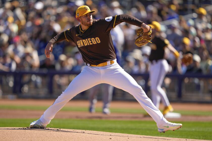 San Diego Padres starting pitcher Joe Musgrove throws to a Los Angeles Dodgers batter during the first inning of spring training baseball game Thursday, Feb. 22, 2024, in Peoria, Ariz. (AP Photo/Lindsey Wasson)