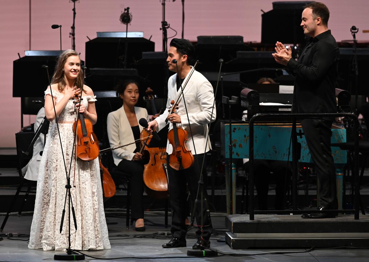 Laura Kukkonen, 18, of Helsinki, Finland, won the L.A. Phil's Play with Ray contest and a chance to perform Bach’s Concerto for Two Violins with Ray Chen on Thursday at the Hollywood Bowl.