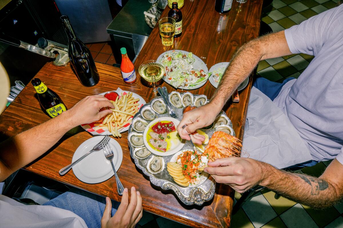 Diners enjoy a spread at Found Oyster in East Hollywood.