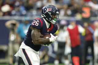 Houston Texans running back Royce Freeman (26) carries the ball during an NFL football game.