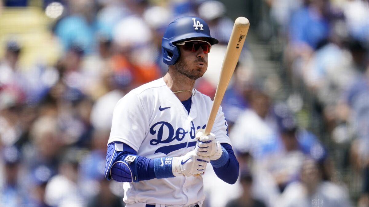 The Dodgers' Cody Bellinger reacts during an at-bat against the Braves