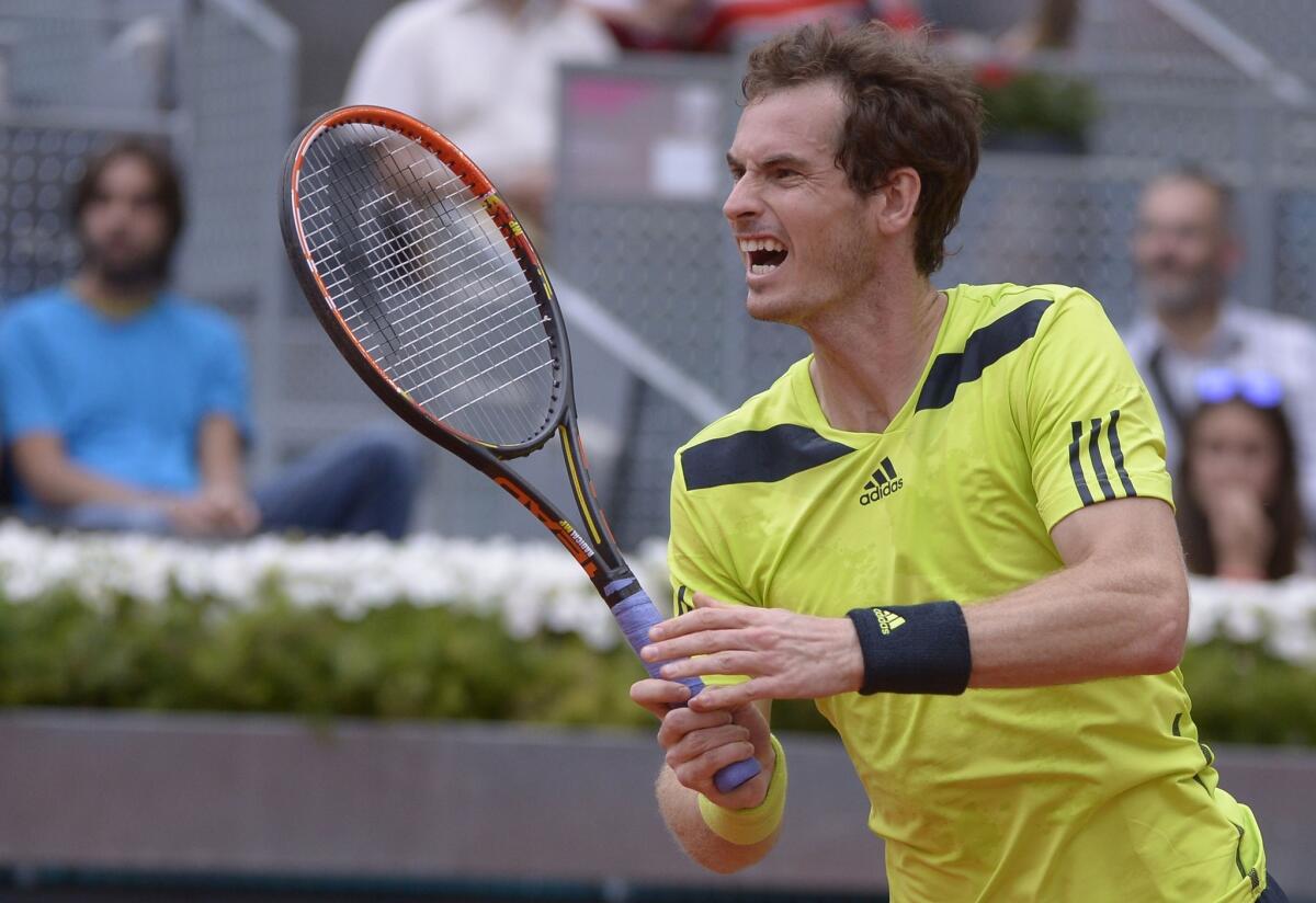 Andy Murray reacts to a wayward shot during his loss to Santiago Giraldo on Thursday at the Madrid Open.