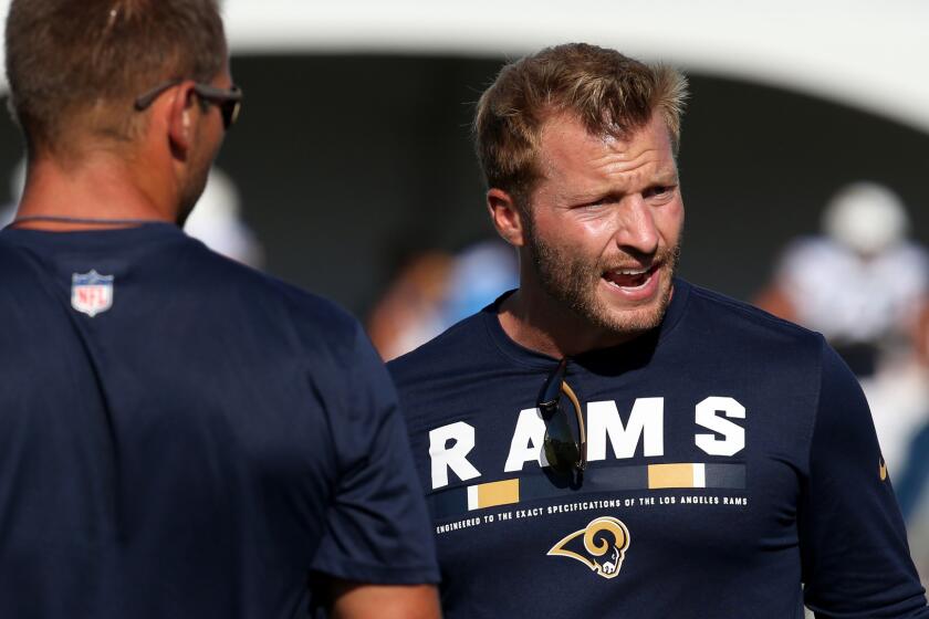 Rams head coach Sean McVay directs his team during a joint practice.