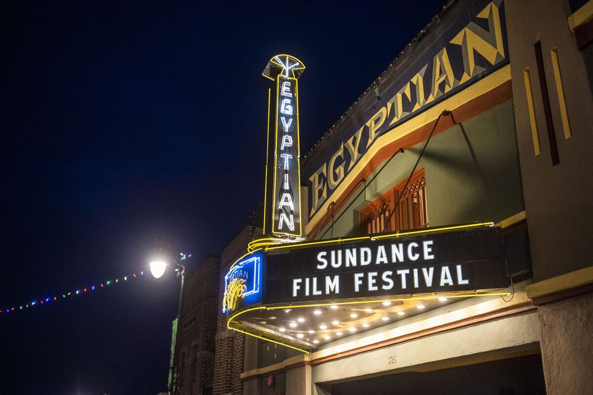 FILE - The marquee of the Egyptian Theatre promotes the 2020 Sundance Film Festival in Park City, Utah on Jan. 28, 2020. The 2022 Festival is requiring people attending the festival or Sundance-affiliated events to have received the COVID-19 vaccine. (Photo by Arthur Mola/Invision/AP, File)