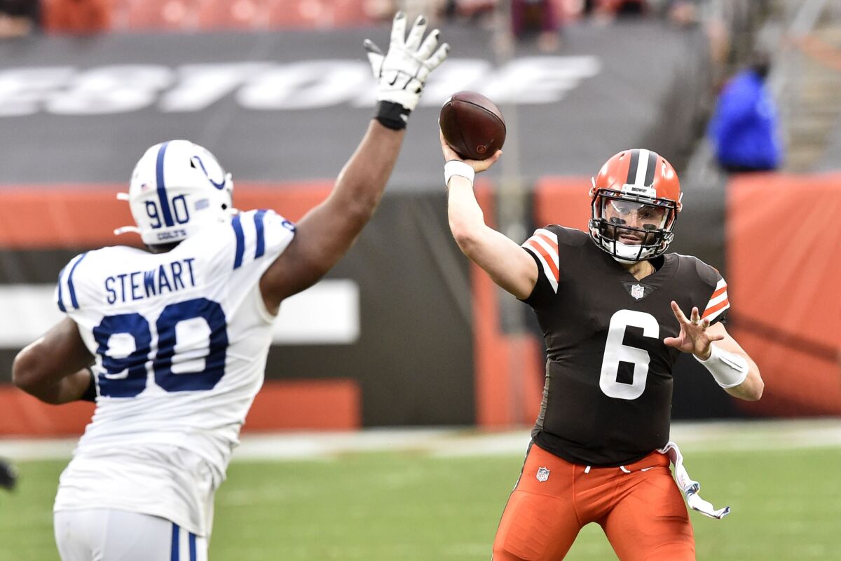 Cleveland Browns quarterback Baker Mayfield (6) throws during the first half of an NFL football game against the Indianapolis Colts, Sunday, Oct. 11, 2020, in Cleveland. (AP Photo/David Richard)