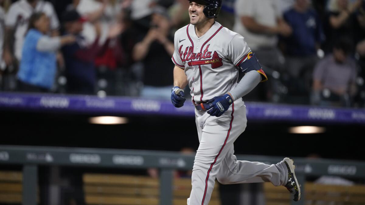 Braves score 4 in 11th, top Rockies 6-2, spoil uniform debut - The