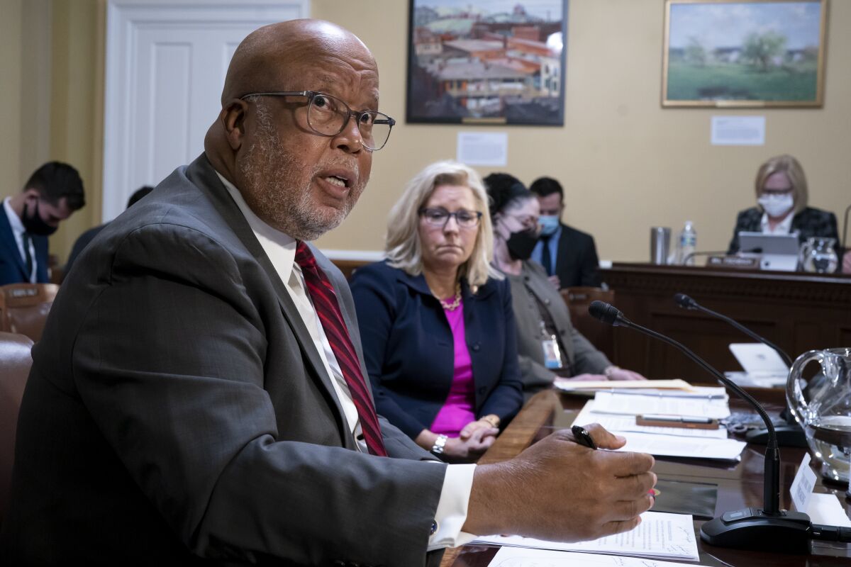 FILE - Chairman Bennie Thompson, D-Miss., and Vice Chair Liz Cheney, R-Wyo., of the House panel investigating the Jan. 6 U.S. Capitol insurrection, testify before the House Rules Committee at the Capitol in Washington, Dec. 14, 2021. The House panel investigating the Jan. 6, 2021 insurrection at the Capitol previewed some of their findings in a federal court filing on Wednesday – and lawmakers on the committee said for the first time that they have enough evidence to suggest Trump committed crimes. (AP Photo/J. Scott Applewhite, File)
