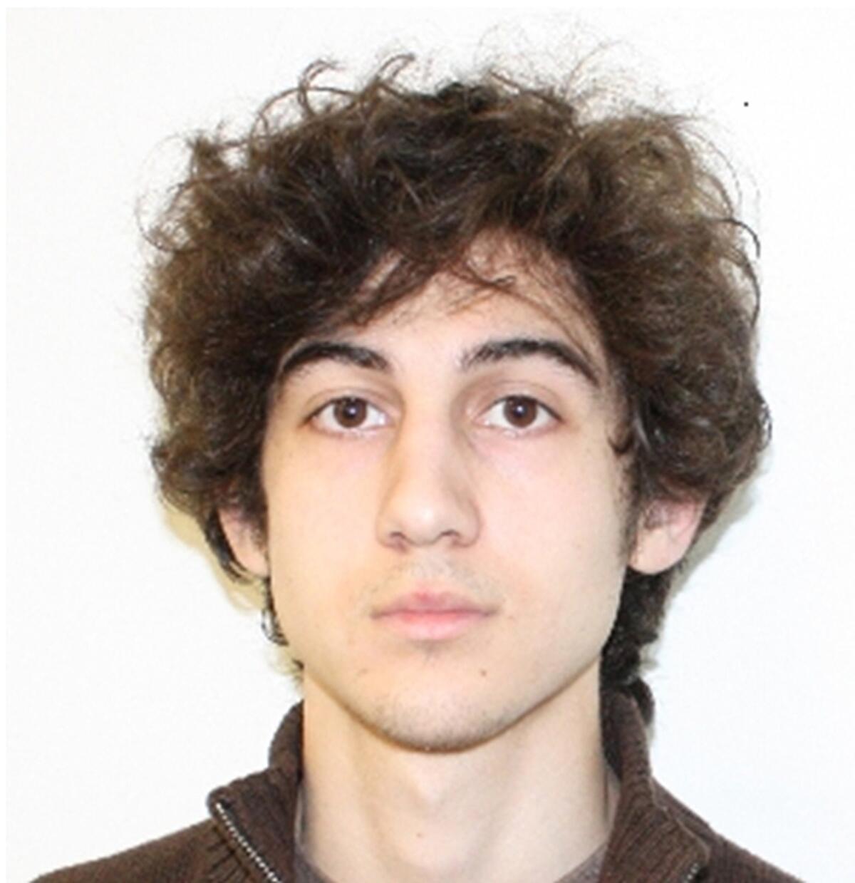 This undated FBI file image released by the FBI shows Boston Marathon bombing suspect Dzhokhar Tsarnaev. A Boston area cabdriver who was friends with the Tsarnaev and his brother has been indicted in connection with the case.