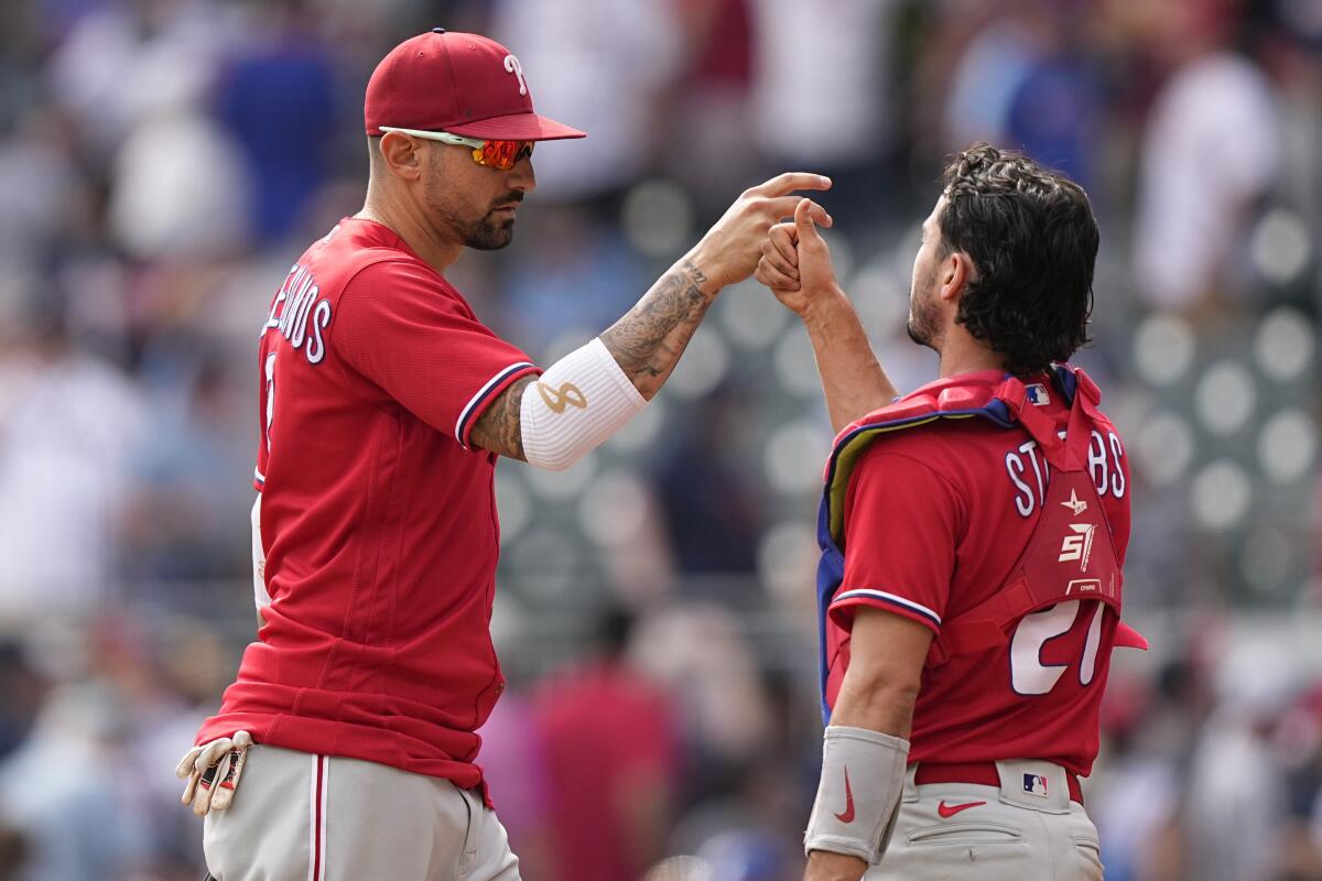 Castellanos hits 2 homers, makes pivotal throw for an out, as Phillies beat  Braves 6-5 in 10 - The San Diego Union-Tribune
