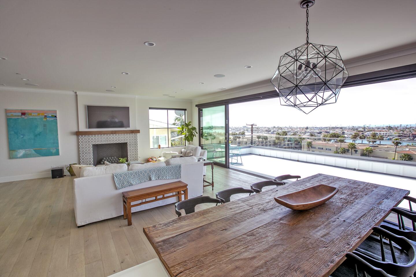 The view from the main room of Trever and Chelsea Gregory's home overlooks Newport Bay. The home will be on display for the Newport Harbor Home Tour.