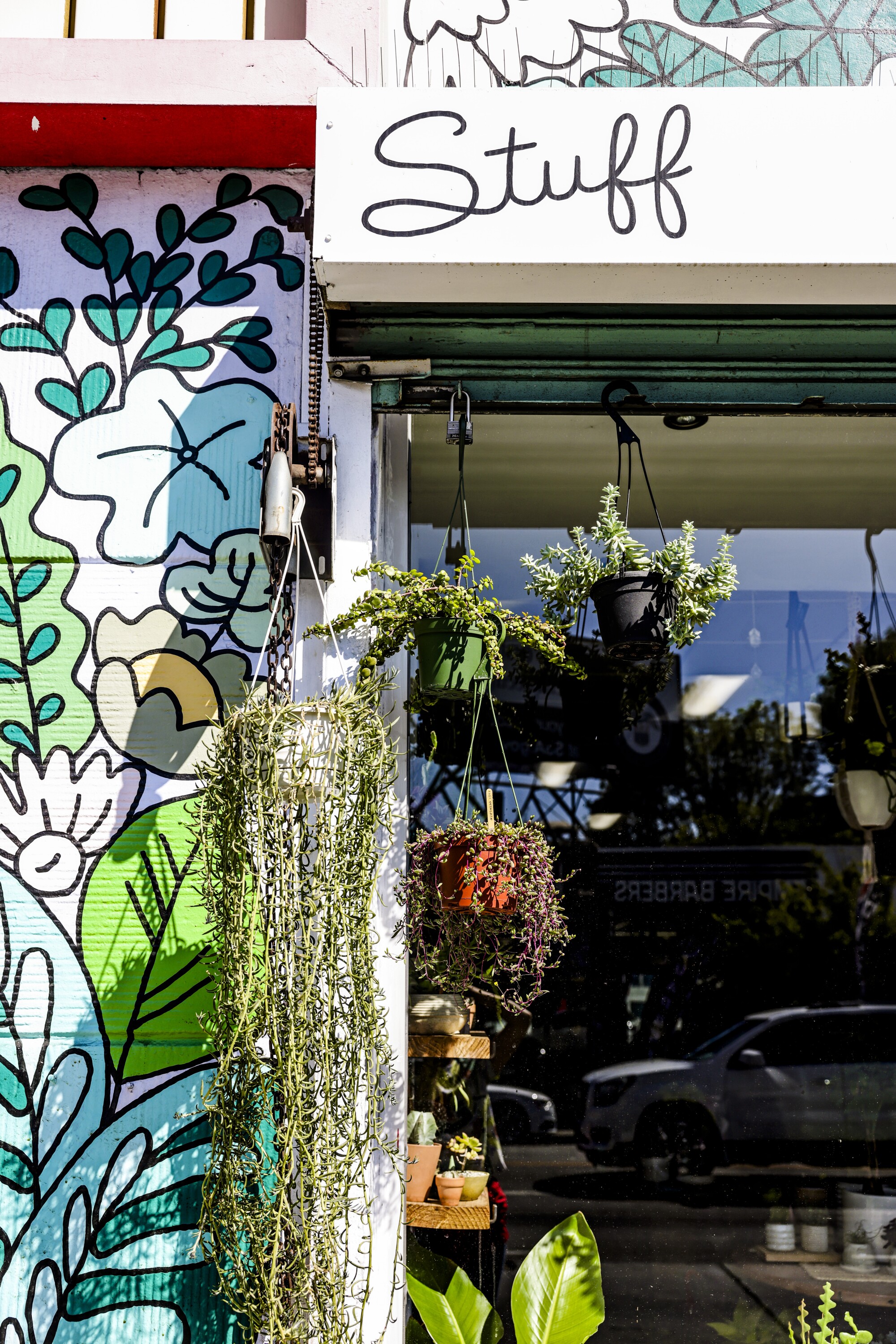 A plants mural outside of a building 