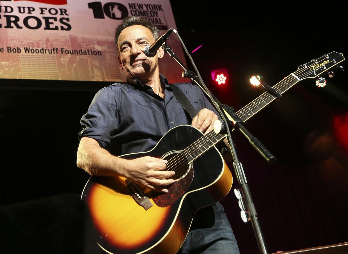 Bruce Springsteen, shown performing at the "Stand Up for Heroes" event at Madison Square Garden in New York, stars in a short film, "Hunter of Invisible Game," a collaboration with director Thom Zimny that premiered Wednesday.