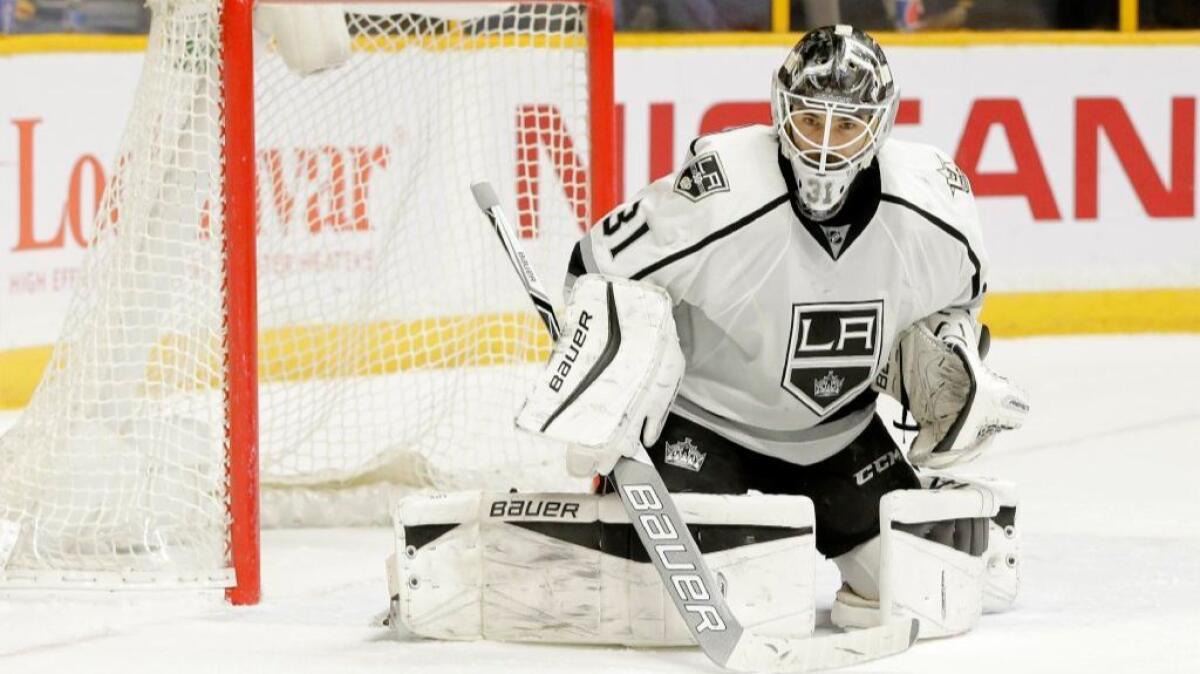 Kings goaltender Peter Budaj makes a stop against the Predators during the second period of a game in Nashville on Dec. 22.