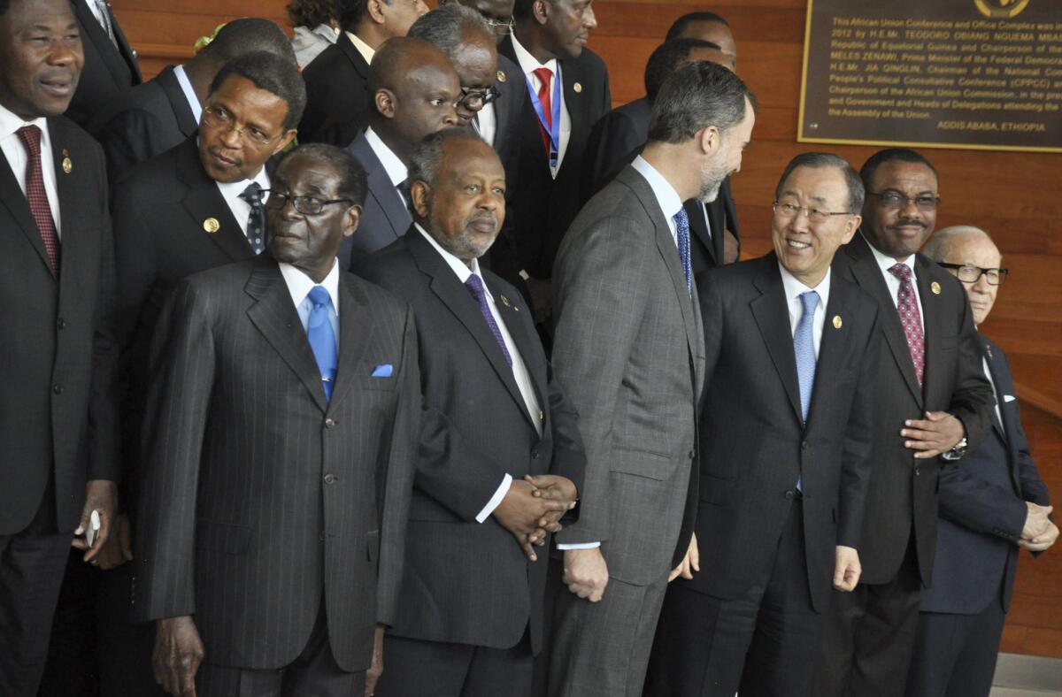 Zimbabwean President Robert Mugabe, front left, poses with other leaders at the annual African Union summit in Addis Ababa, Ethiopia, on Friday.