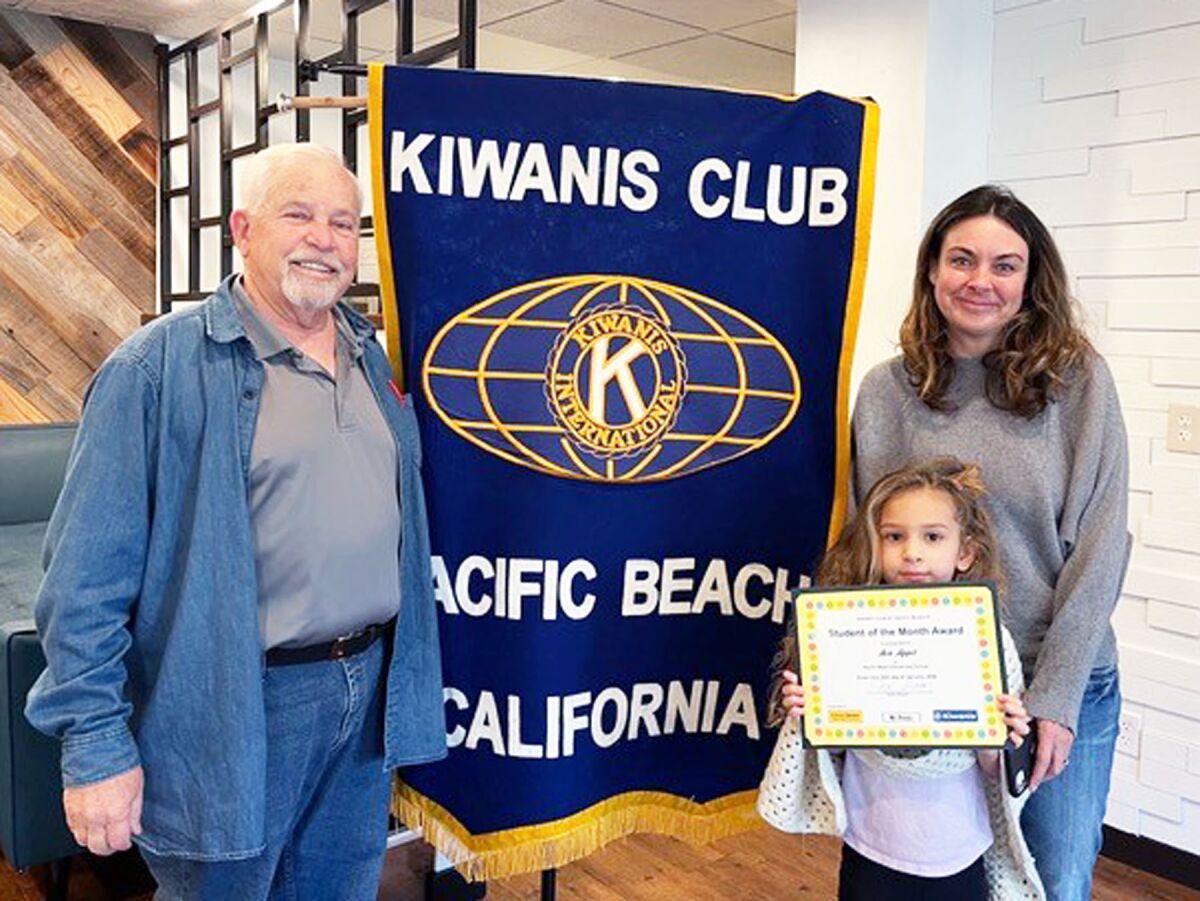 Pacific Beach Kiwanis Club President Matt Serritella with Ava Appel and her mother, Mary Appel.