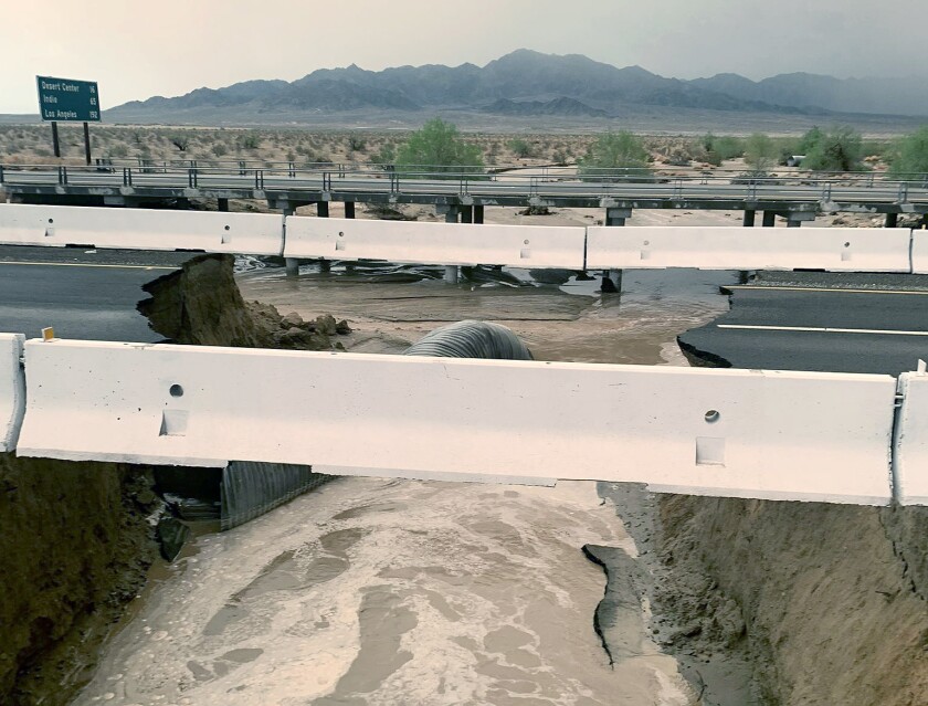 freeway washed out by flooding.
