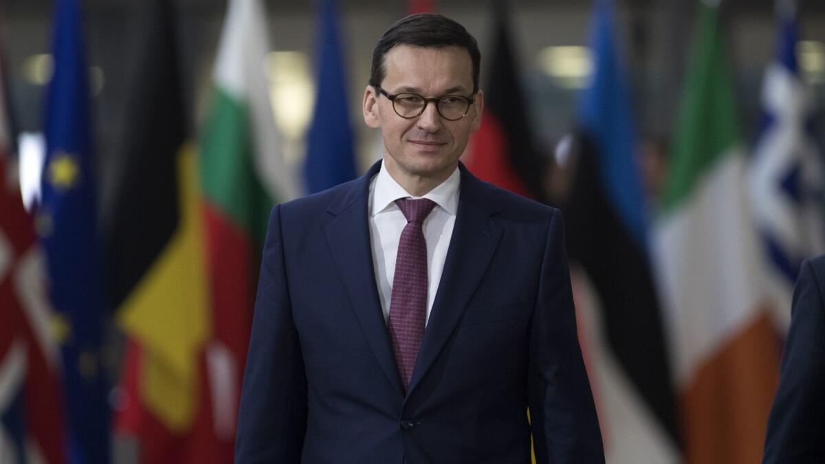 Prime Minister of Poland Mateusz Morawiecki arrives for the European Union leaders summit at the European Council on Thursday in Brussels.
