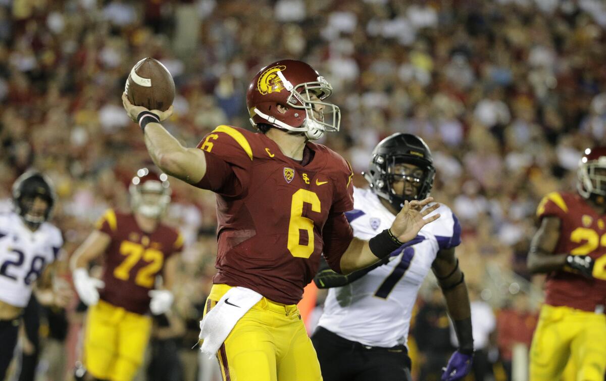 USC quarterback Cody Kessler throws a pass against Washington during the first half on Thursday.