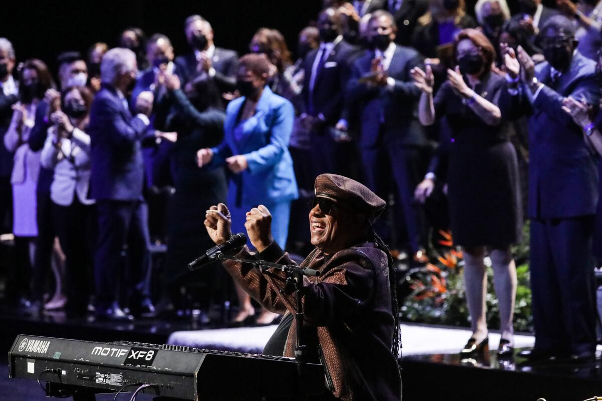 Musician Stevie Wonder performs during the inauguration of Karen Bass