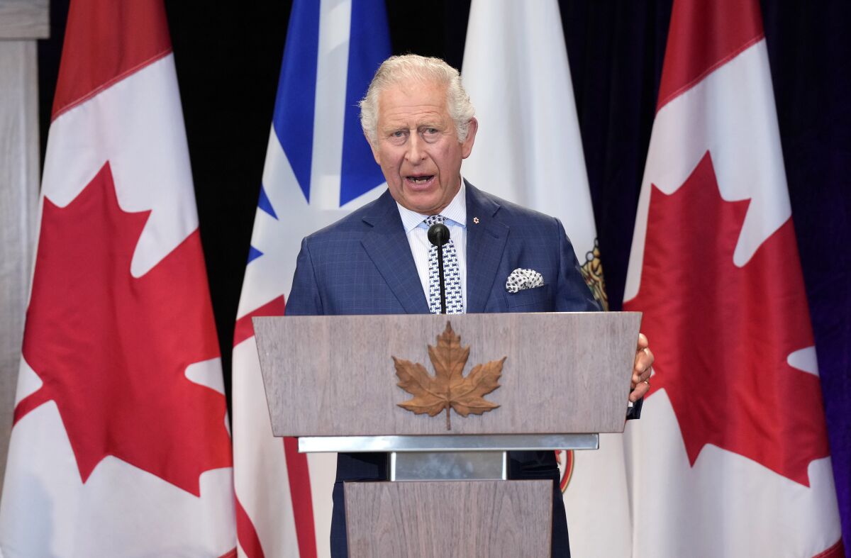 Prince Charles speaks during a welcoming ceremony upon his arrival in St. John's, as he and Camilla, Duchess of Cornwall, begin a three-day Canadian tour, Tuesday, May 17, 2022. (Paul Chiasson/The Canadian Press via AP)