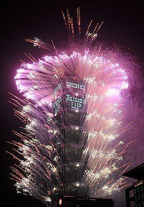 Fireworks are launched from the Taipei 101 building to celebrate the new year.