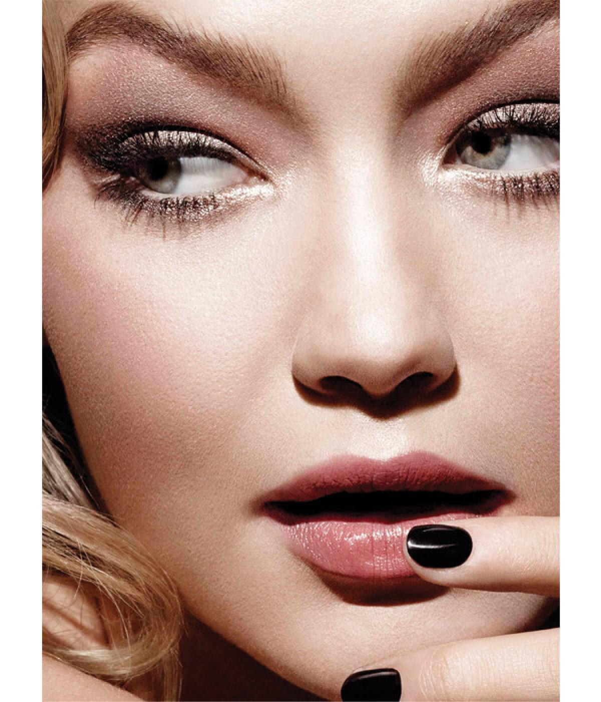 Tom Ford Beauty fall 2014 advertisement featuring model Gigi Hadid.