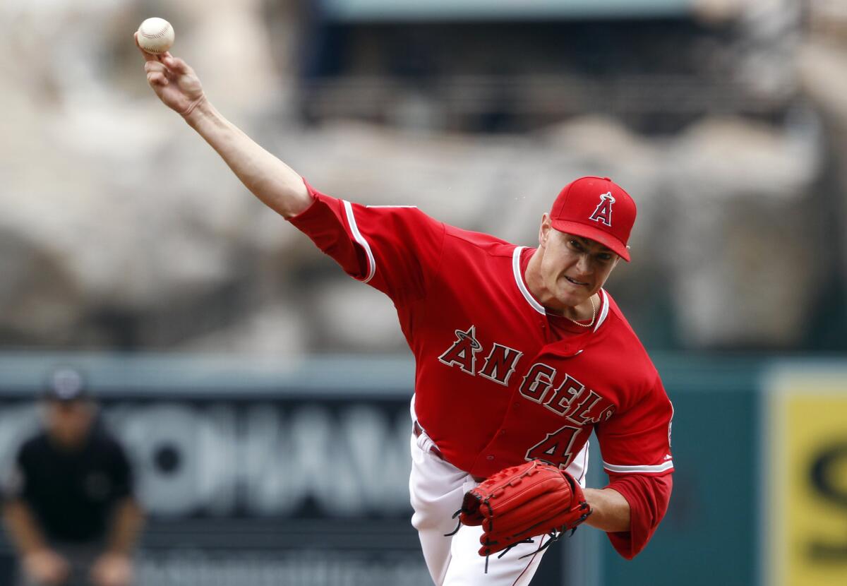 Angels starter Garrett Richards gave up two runs and seven hits in 7 2/3 innings on Saturday, dominating Seattle batters with first-pitch strikes.