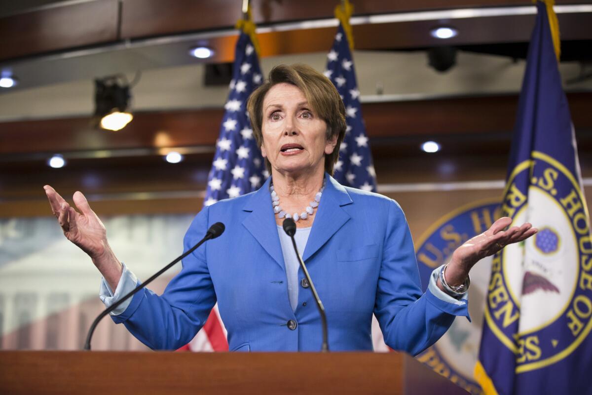 House Minority Leader Nancy Pelosi (D-San Francisco), pictured at a Washington news conference this month, is supporting an anti-deportation bill in Sacramento along with 27 other California Democrats in Congress.