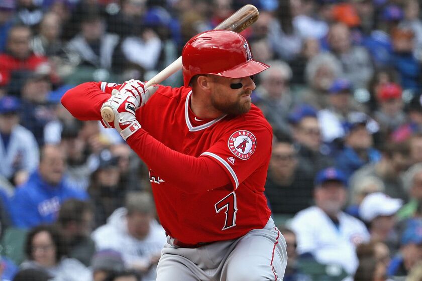 CHICAGO, ILLINOIS - APRIL 12: Zack Cozart #7 of the Los Angeles Angels bats against the Chicago Cubs at Wrigley Field on April 12, 2019 in Chicago, Illinois. (Photo by Jonathan Daniel/Getty Images)