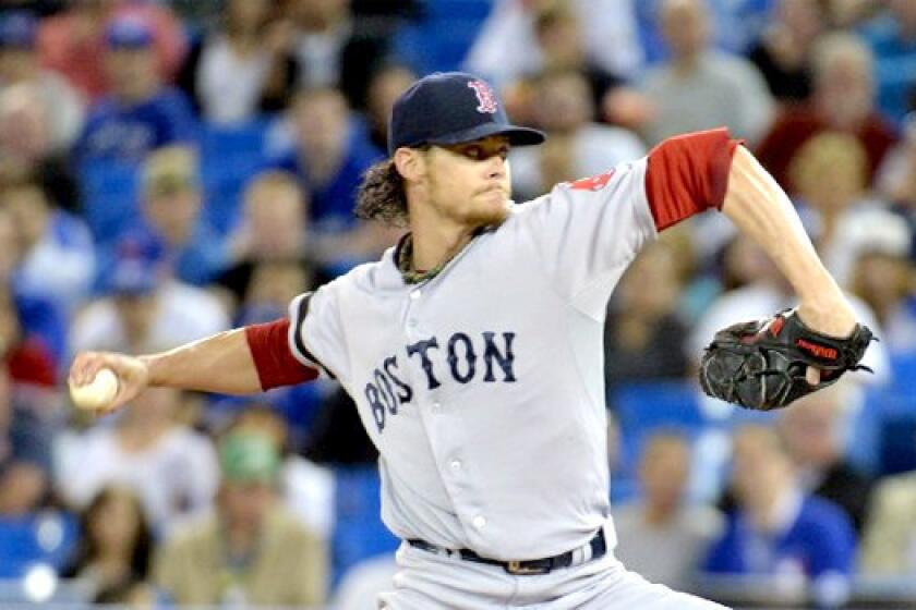 Red Sox pitcher Clay Buchholz, whose 6-0 record leads the majors, denies accusations from a Blue Jays radio color commentator that he cheated during Boston's 10-1 victory over Toronto on Wednesday.