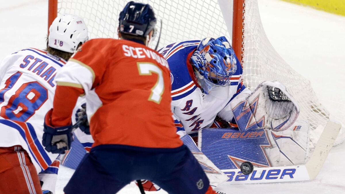 New York Rangers goalie Henrik Lundqvist blocks a shot by Florida's Colton Sceviour on March 7.