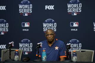 Houston Astros manager Dusty Baker Jr. listens to a question during a news conference 