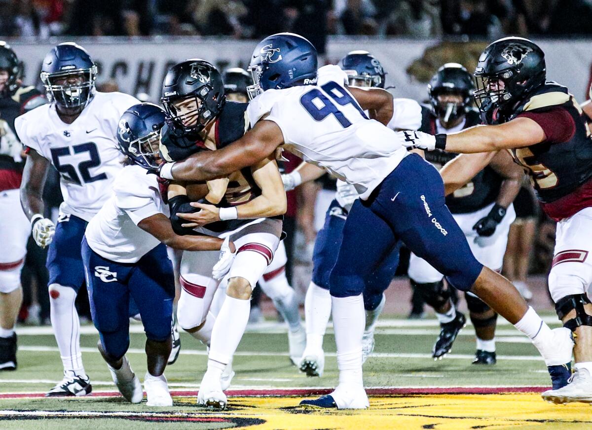 Defensive end Richard Wesley stops an opponent.