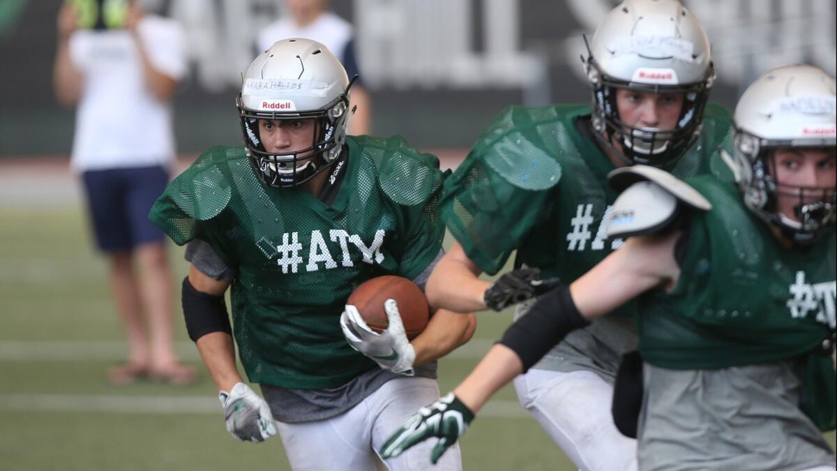 Nicholas Karahalios, a running back, is one of four key seniors this year for the Sage Hill School 8-man football team.