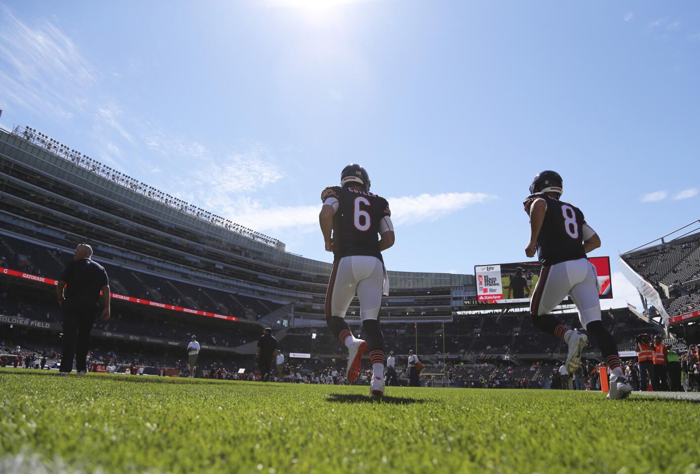 Quarterbacks Jay Cutler and Jimmy Clausen take the field for the Week 2 game against the Cardinals at Soldier Field.