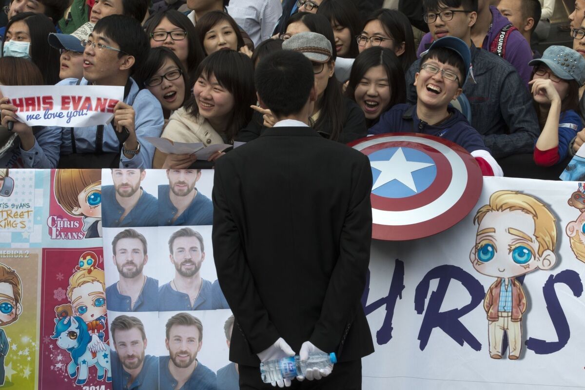 In Beijing, fans wait for the arrival of Chris Evans during a March publicity event ahead of the April release of his movie "Captain America: The Winter Soldier."