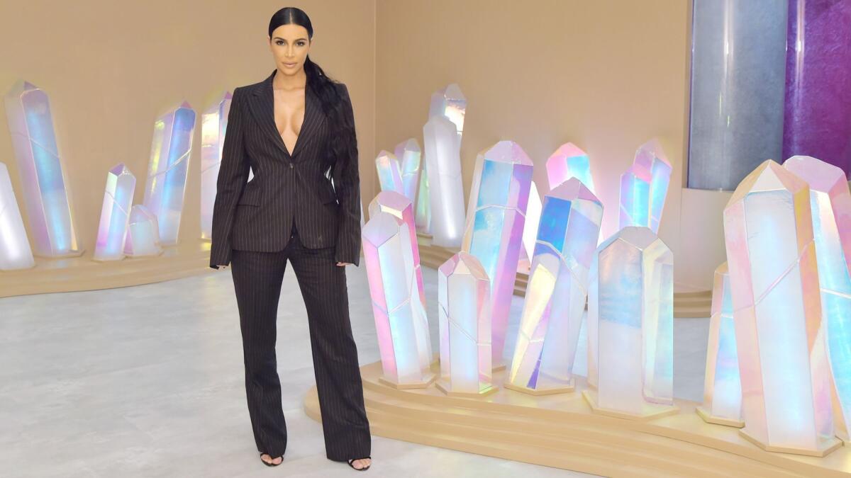 Kim Kardashian West attends the opening of her KKW Beauty and Fragrance pop-up store at South Coast Plaza in Costa Mesa on Tuesday.