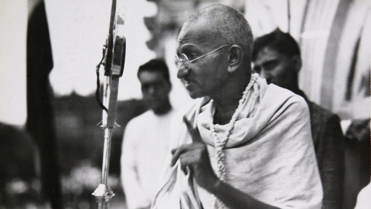 Indian independence leader Mohandas K. Gandhi addresses a crowd in 1931.