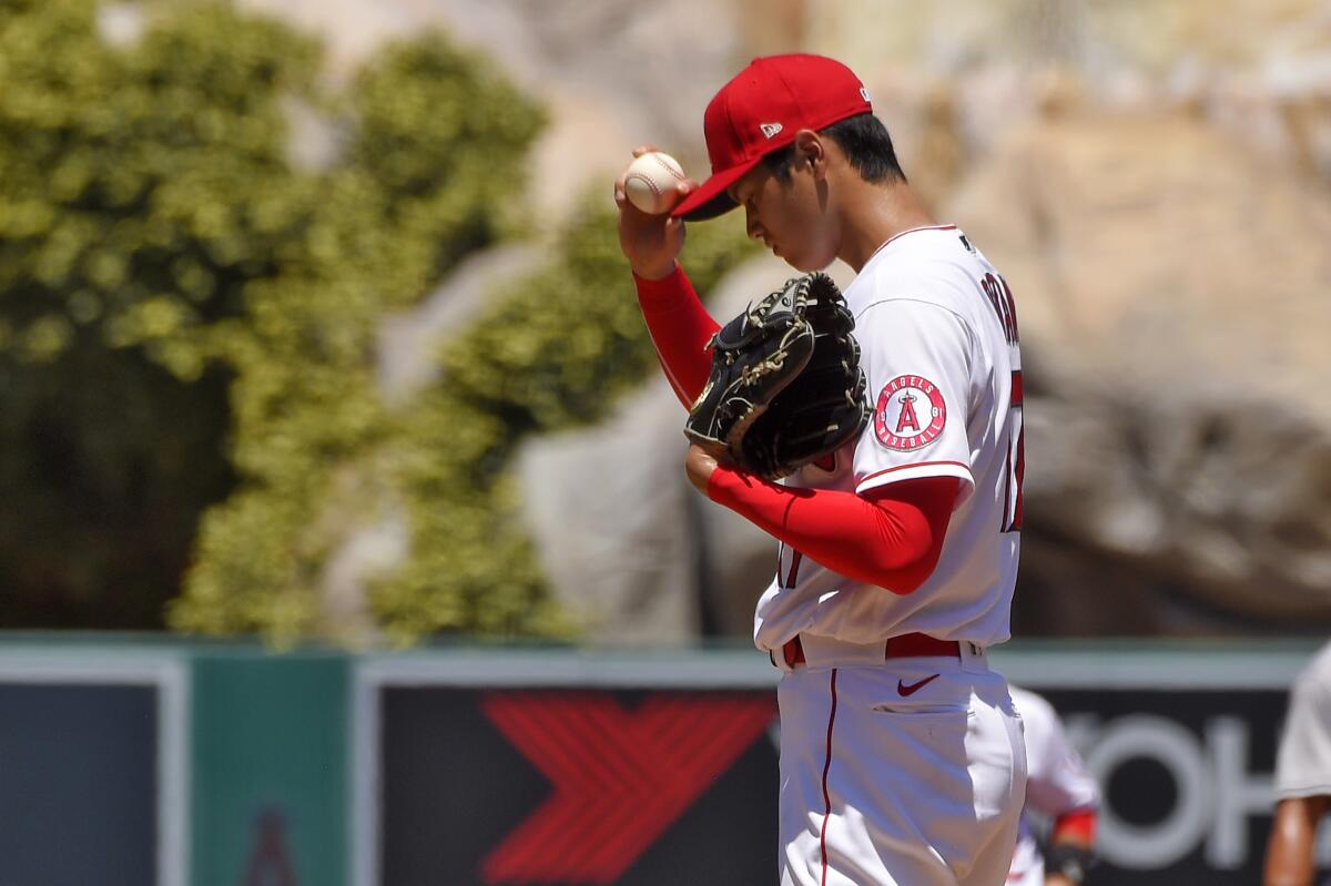 Ohtani believes he can play OF 'right now' but focused on return to mound