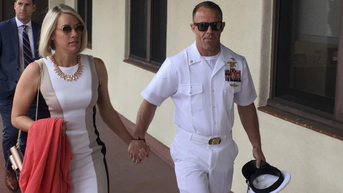 Edward Gallagher and his wife, Andrea, arrive at military court in San Diego.