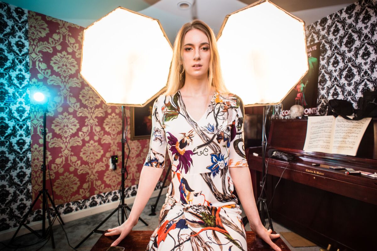 Natalie Wynn, known as YouTube star ContraPoints, in the basement studio of a row house in a working-class Baltimore neighborhood where she shoots her videos.