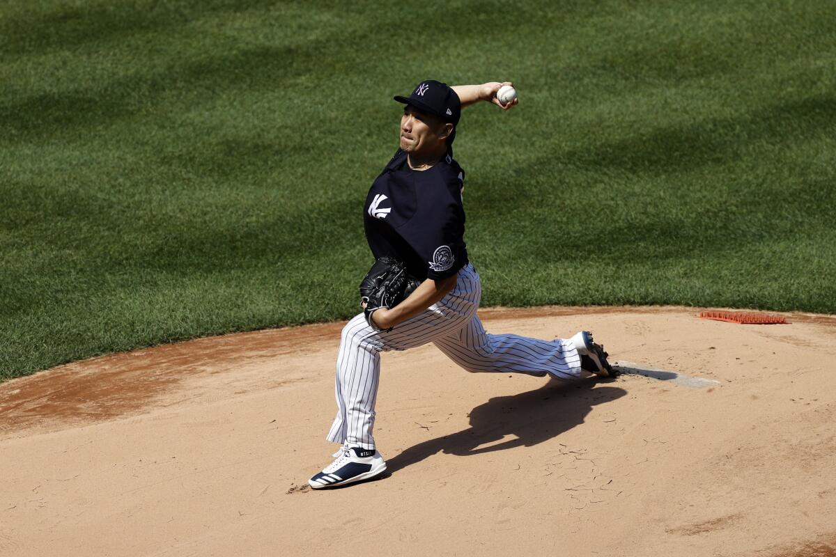 Masahiro Tanaka delivers a pitch during a Yankees team practice July 4, 2020, at Yankee Stadium.