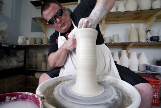 San Diego, CA - June 04: Kelvin Crosby works in his ceramic studio on Friday, June 4, 2021 in San Diego, CA., in a separate room behind his motherÕs home. Crosby starts between 12-20 pieces a day and then continues the work on 50-150 other pieces that are in various stages of the process. (Nelvin C. Cepeda / The San Diego Union-Tribune)