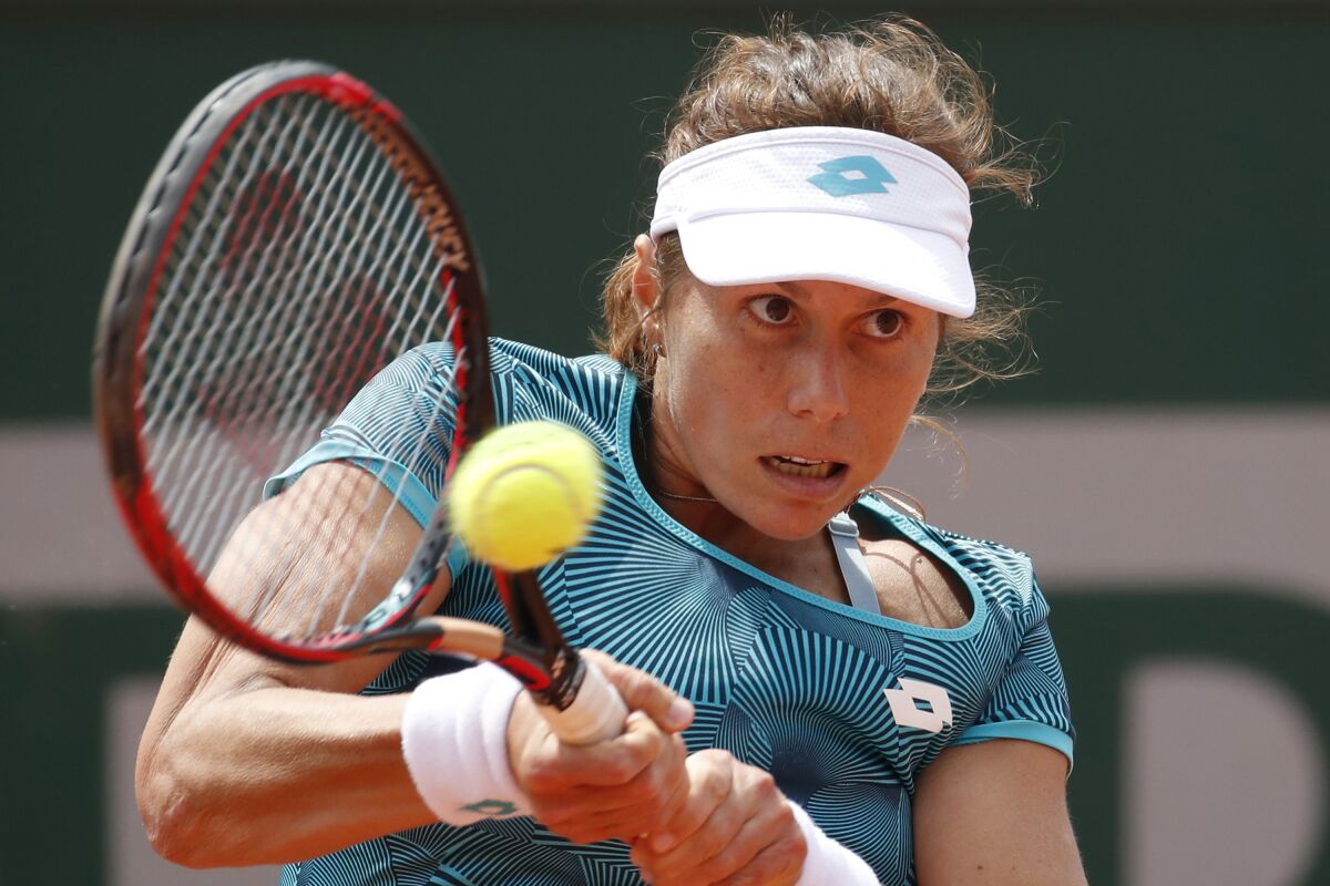 FILE - Varvara Lepchenko plays a shot against China's Zhang Shuai during their first round match of the French Open tennis tournament at the Roland Garros stadium in Paris, Monday, May 27, 2019. Former Top 20 player Varvara Lepchenko has been given a four-year doping suspension announced Friday, March 4, 2022, by the International Tennis Integrity Agency after she tested positive for a banned stimulant at a tournament in 2021. (AP Photo/Christophe Ena, File)